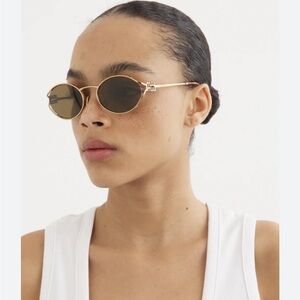 Miu Miu Gold Oval Sunglasses